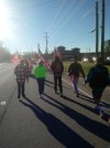 Supporters walking with Doc Brown