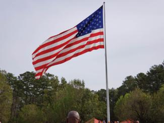 Flag waving at Devil Dog Ceremony